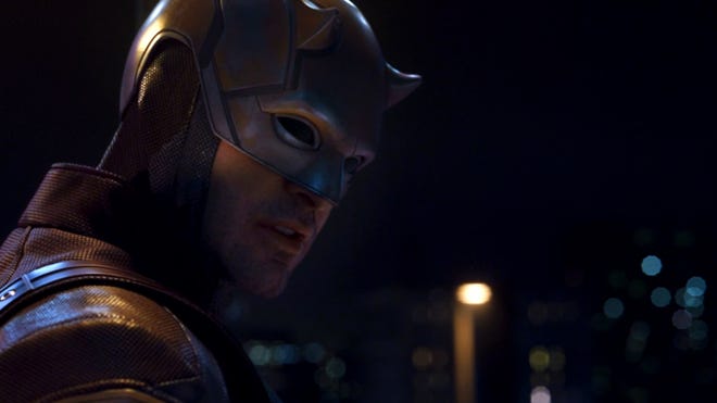 Still image featuring Charlie Cox in daredevil suit