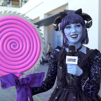 April cosplaying as Jester from Critical Role.