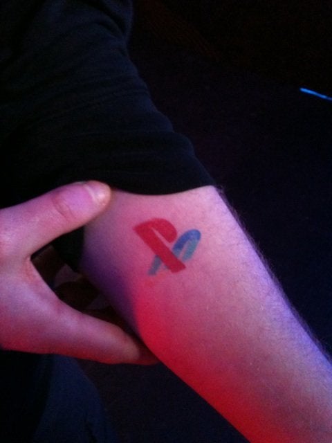 SOME DIE HARD PLAYSTATION FANS GO AND GET SOME TATTOOS