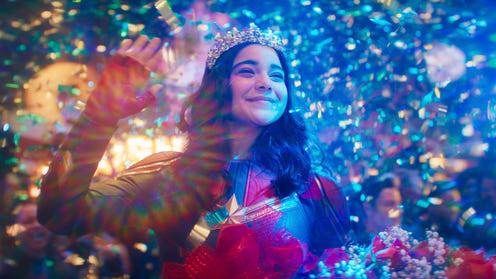 Ms. Marvel still Iman Vellani as Kamala Khan wearing a Tiara and waving whilst surrounded by confetti