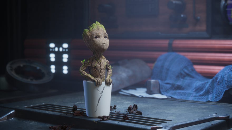 Still image featuirng Groot looking up and out of his pot