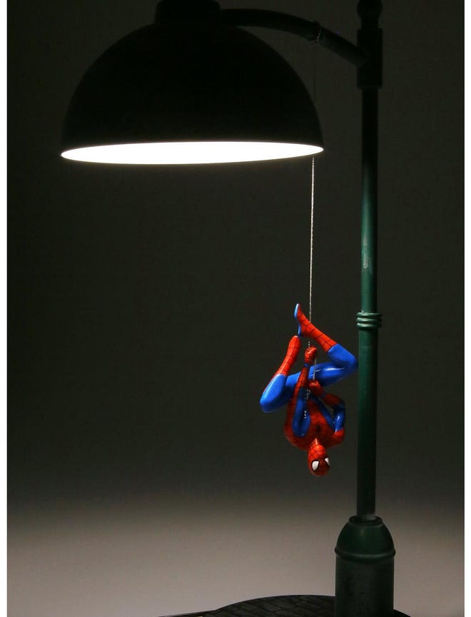 Spider-Man lamp on a black background
