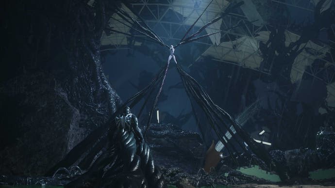 Venom's Symbiote suspends Peter Parker as Spider-Man above the ground.