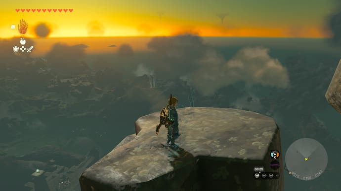Link standing on a tiny floating island against a beautiful sunset in The Legend of Zelda: Tears of the Kingdom.