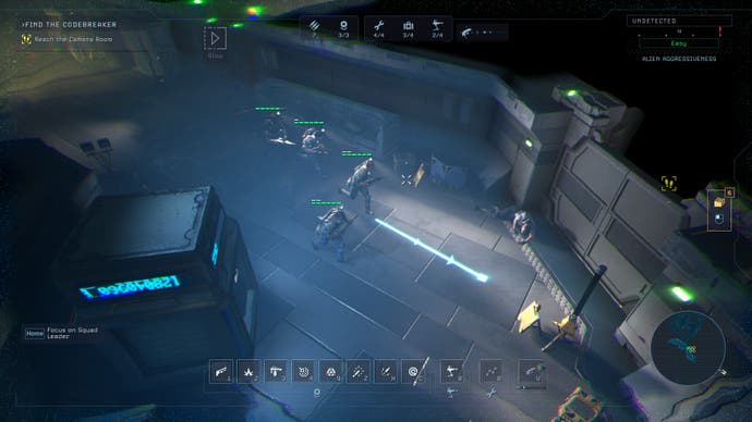 A screenshot of the player’s marine squad advancing down a space station corridor in Tindalos Interactive’s real-time tactics game Aliens: Dark Descent, with no aliens to worry about for the moment.