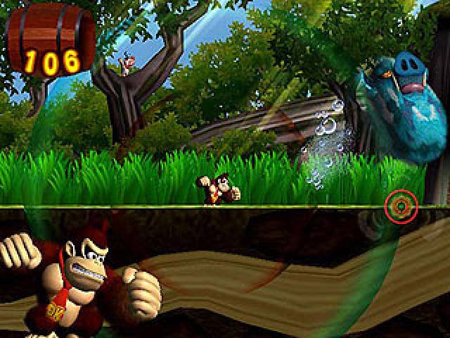 Shigeru Miyamoto in a press shot, in a donkey kong barrel (x-r