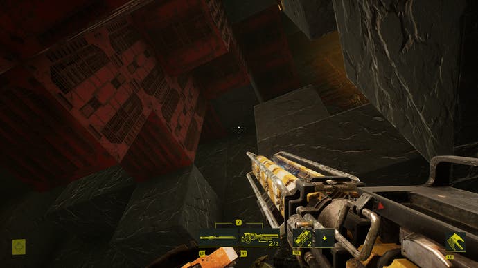 A screenshot of Meet Your Maker, a shooter with base-building elements, showing the player looking up at a cavernous interior.