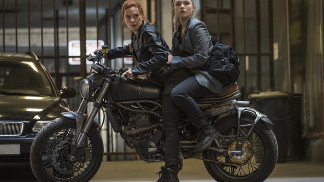 Florence Pugh and Scarlet Johansson on motorcycle in Black Widow