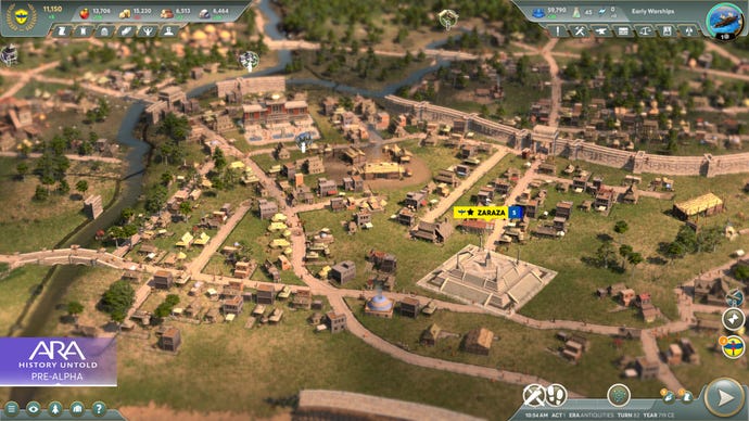 A screenshot of Ara: History Untold, showing roads, buildings and city walls laid out across a green plain