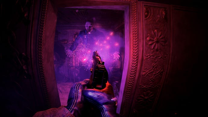 A player shooting a monster with a pistol through a door in KnifePlayground.