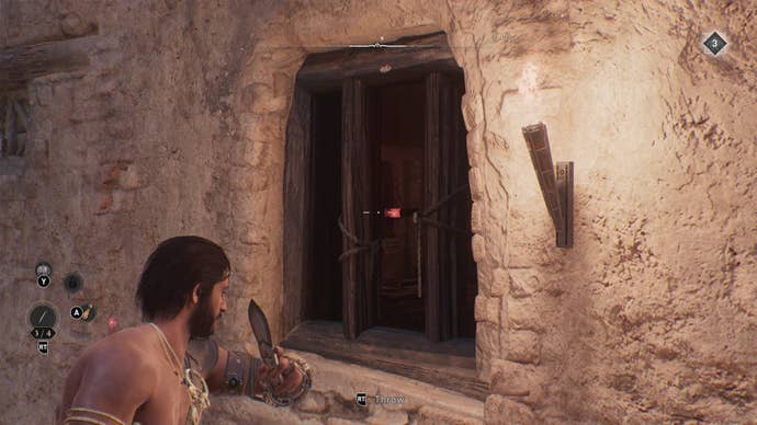 Basim aims a throwing knife through a barred window at another, breakable window in Assassin's Creed Mirage