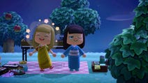 Two players enjoying a late night picnic in Animal Crossing