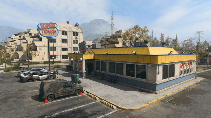 drone view of burger town landmark in urzikstan war zone map