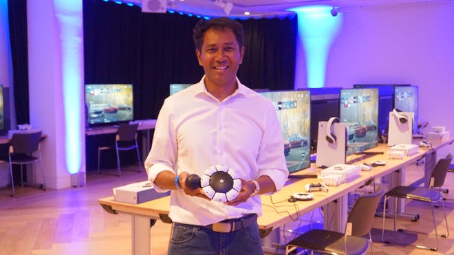 Photo of Alvin Daniel from Sony holding the Access controller
