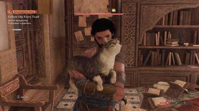 Basim fusses a gorgeous cat in Assassin's Creed Mirage