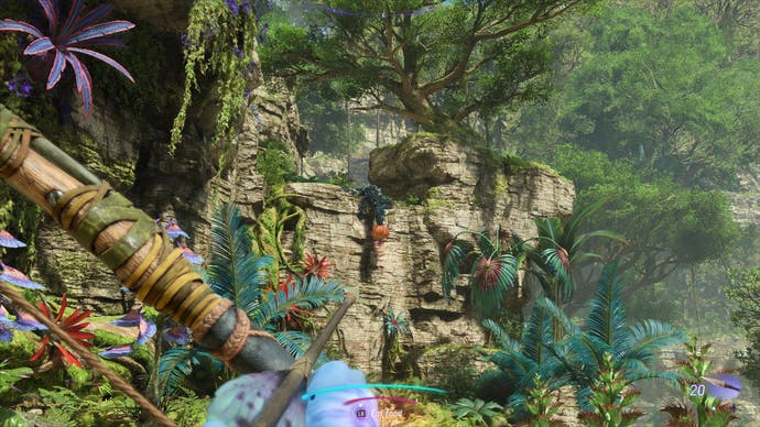 The player aims at an orange fruit to release a rope in Avatar: Frontiers of Pandora.