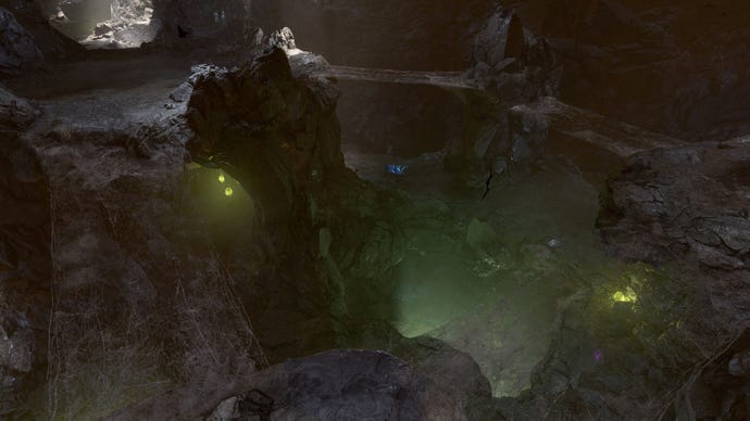 Baldur's Gate 3 image showing a pit to the Underdark, illuminated with a faint green glow.
