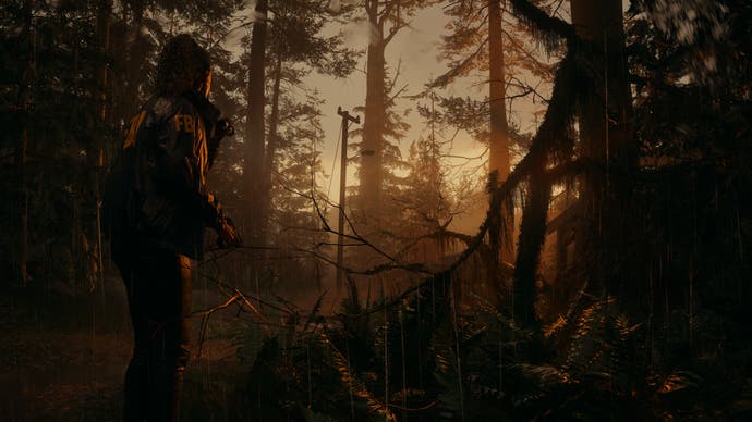 Alan Wake 2 screenshot showing Saga in the left foreground looking into a pine forest at sunset