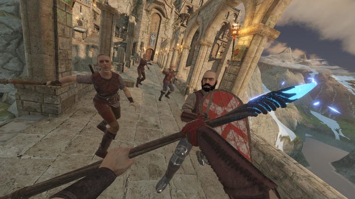 Attacking enemies on a bridge with an ice staff in VR game Blade And Sorcery