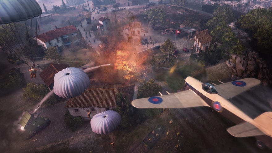 A plane flies over a wartorn village in Company Of Heroes 3