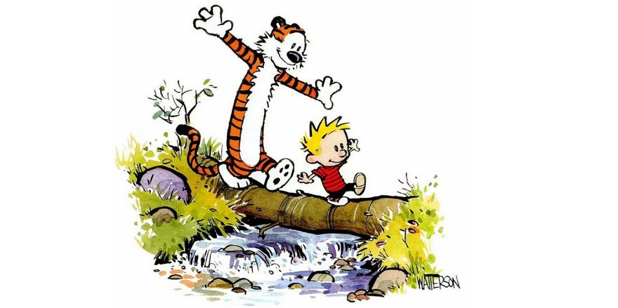 Calvin and Hobbes on a tree bridge