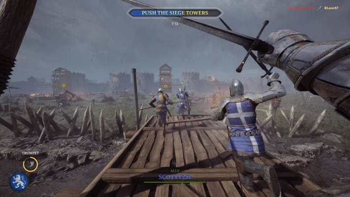 Soldiers charge toward siege towers in Chivalry 2