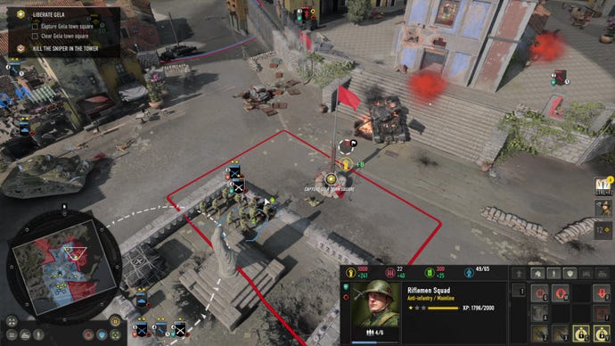 Two tanks do battle in a town square in Company Of Heroes 3