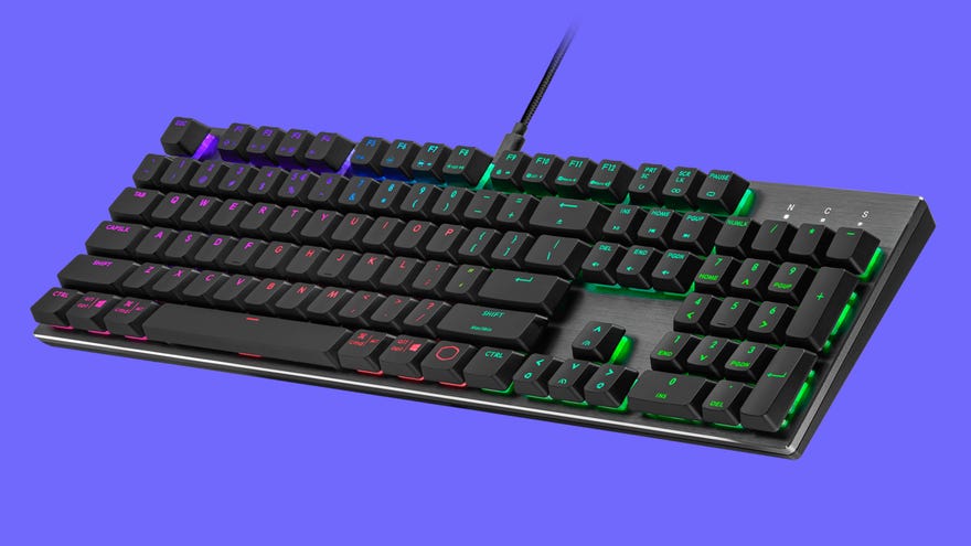 The Cooler Master SK652 gaming keyboard against a plain blue background.