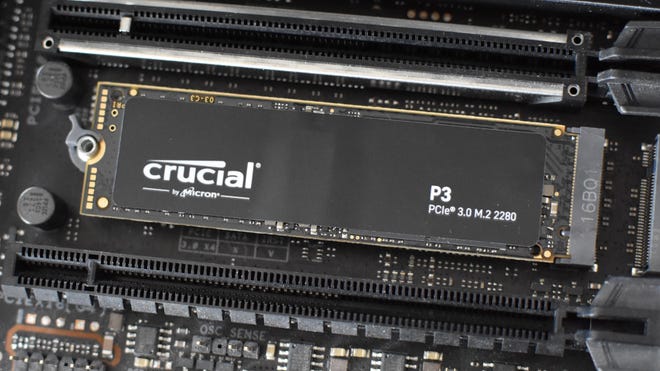 The Crucial P3 SSD installed in a motherboard's M.2 socket.