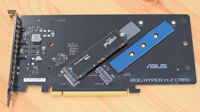 A Crucial T700 SSD installed in an Asus ROG Hyper M.2 adapter.