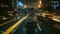 A nighttime driving scene in Cyberpunk 2077: Phantom Liberty, with DLSS 3.5 Ray Reconstruction switched off.
