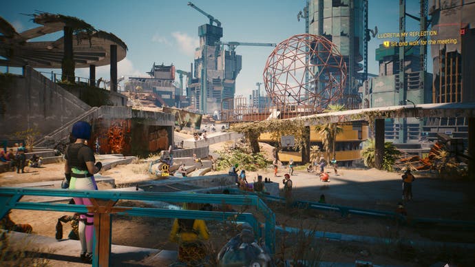 Capture d'écran de Cyberpunk 2077 Phantom Liberty montrant un quartier animé et ensoleillé dans la nouvelle zone de Dogtown