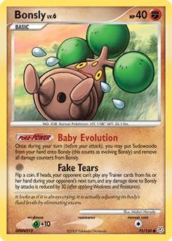 Bonsly Pokemon card showing character on its back crying