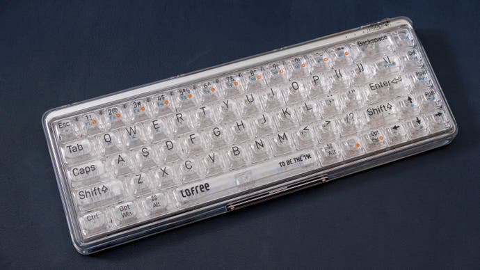 a loffree 1% mechanical keyboard, with a unique white transparent 'ice cube' appearance