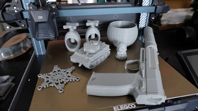 elegoo neptune 4 3d printed models, including a tiger tank, usp-s, bowl, nutcrackers, star and more