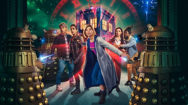 Promotional picture of the Thirteenth Doctor and her companions facing off with Daleks
