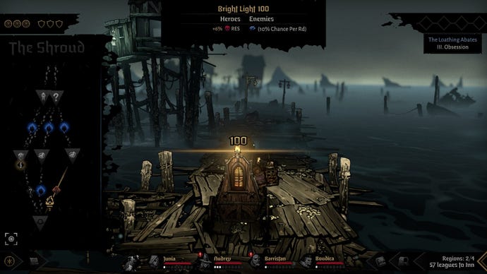 A caravan makes its way through an abandoned village in Darkest Dungeon 2