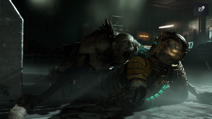 Dead Space remake review - Clarke attacked by a zombie on the floor