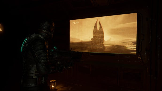 Isaac looks at a screen showing The Marker in Dead Space