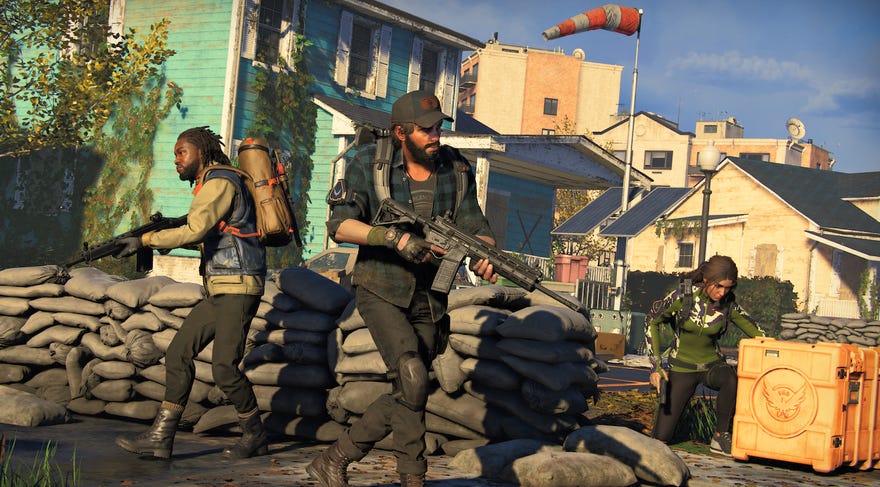 Three soldiers raise their guns in a screenshot from The Division Heartland