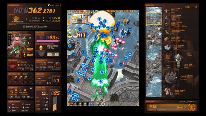 A screenshot showing gameplay in shooting game DoDonPachi Blissful Death Re:Incarnation’s Black Label mode, with the player ship firing a blue laser and destroying elements of a flying battleship.