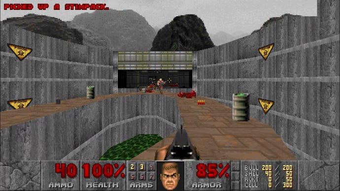 An outdoor arena with a poison ditch in the centre in Doom (1993)