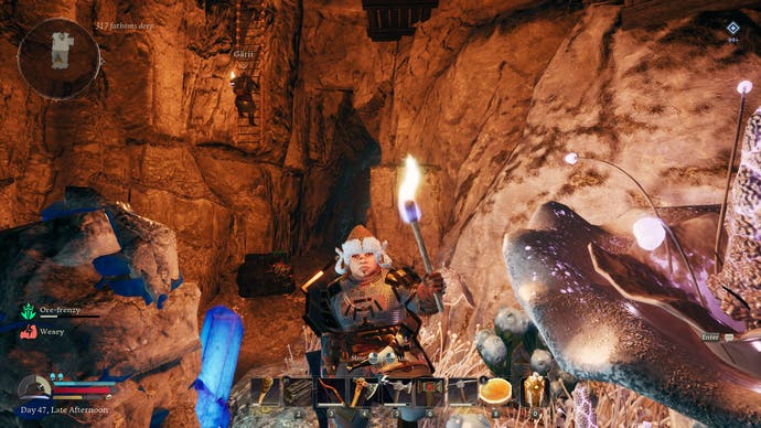 LOTR Return to Moria screenshot - In the foreground a dwarf faces the camera, while in the background another player can be seen climbing a ladder. They are in a cavern of stone, surrounded by glowing mushrooms.