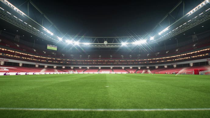 Captura de pantalla de EA Sports FC 24, que muestra una toma amplia del Emirates Stadium por la noche.