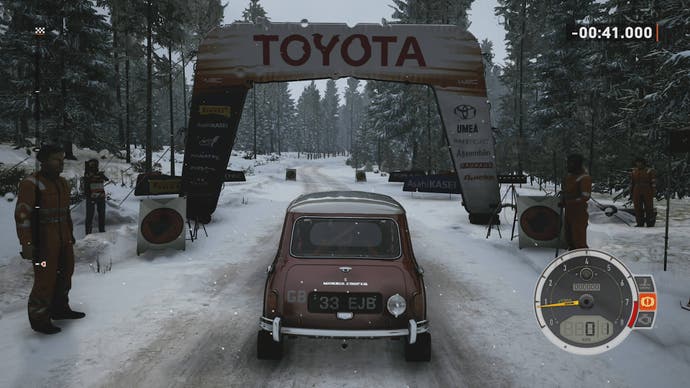 EA Sports WRC review 2: Showing a mini waiting at the starting line in a snowy forest.