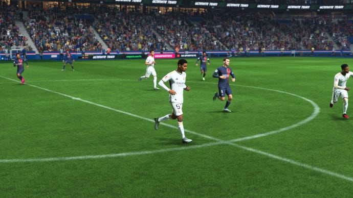 Jude Bellingham, one of the best midfielders in EAFC 24, closing down the ball for Real Madrid against PSG