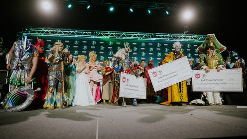 Photograph of cosplayers on ECCC stage