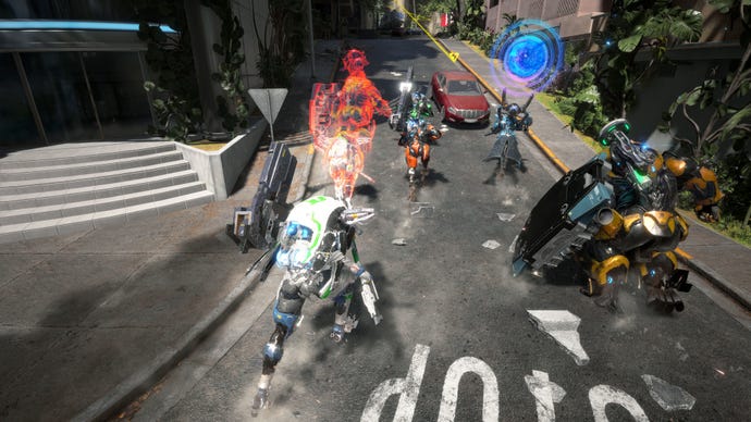 A group of exosuit warriors rush through a street in Exoprimal