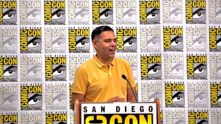 Photograph of Congressman Robert Garcia standing at a San Diego Comic Con podium
