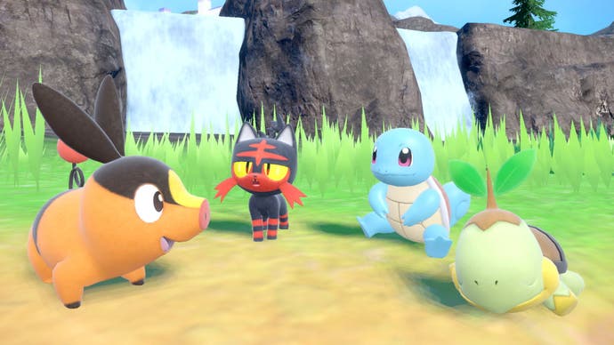 Immagine del DLC Pokémon Scarlatto e Viola Tesoro Nascosto dell'Area Zero che mostra Tepig, Litten, Squirtle e Turtwig in-game